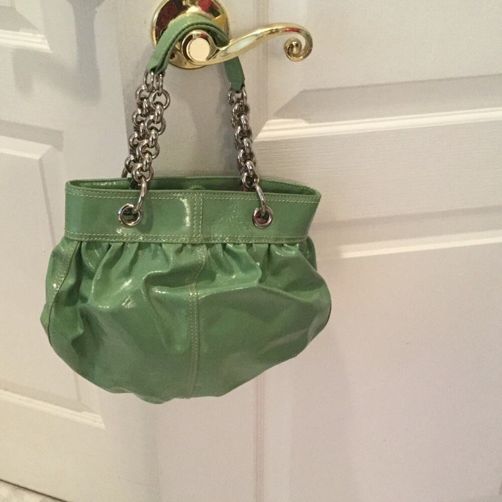 Ladies patent leather DKNY handbag w/chain detail